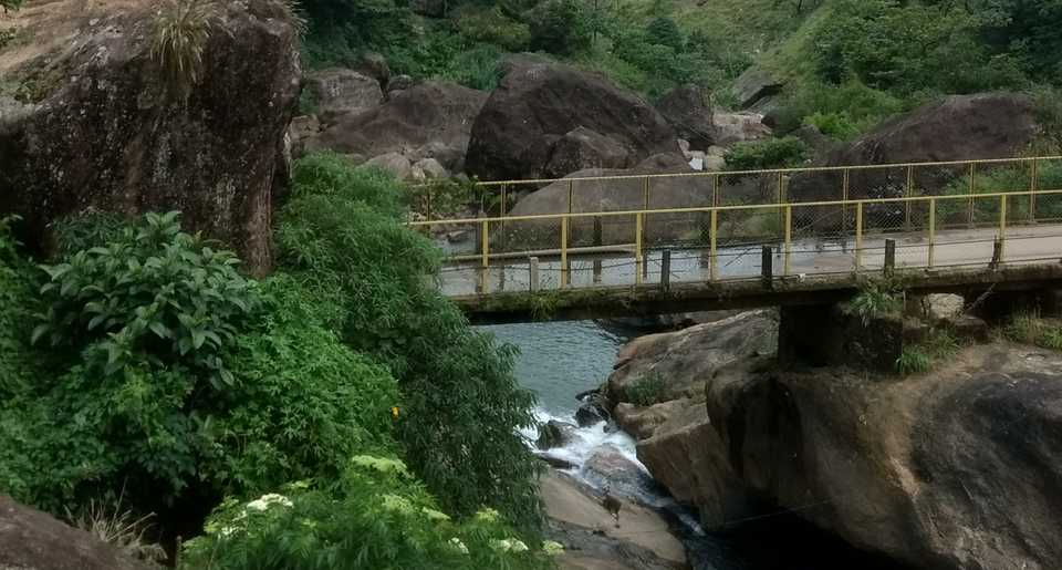 Single Lane bridge across Muthirappuzhayar river at Attukad Falls