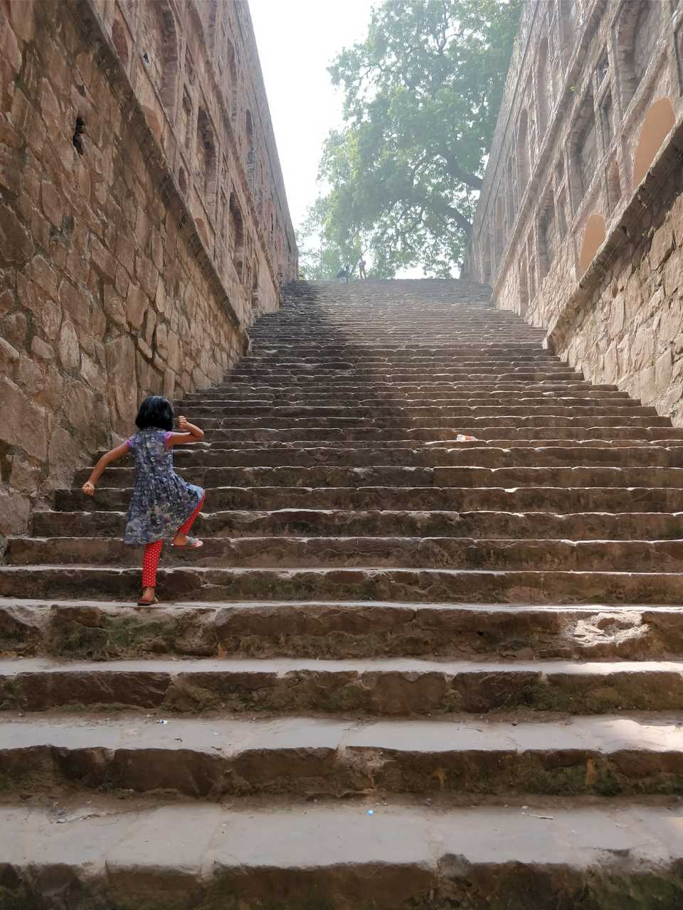 Looking up at the steps of Agrasen Ki Baoli from the bottom