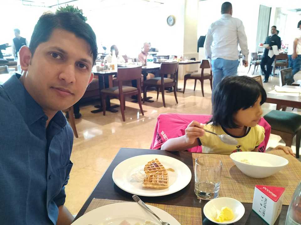 Aravind and Laasya having breakfast in a hotel
